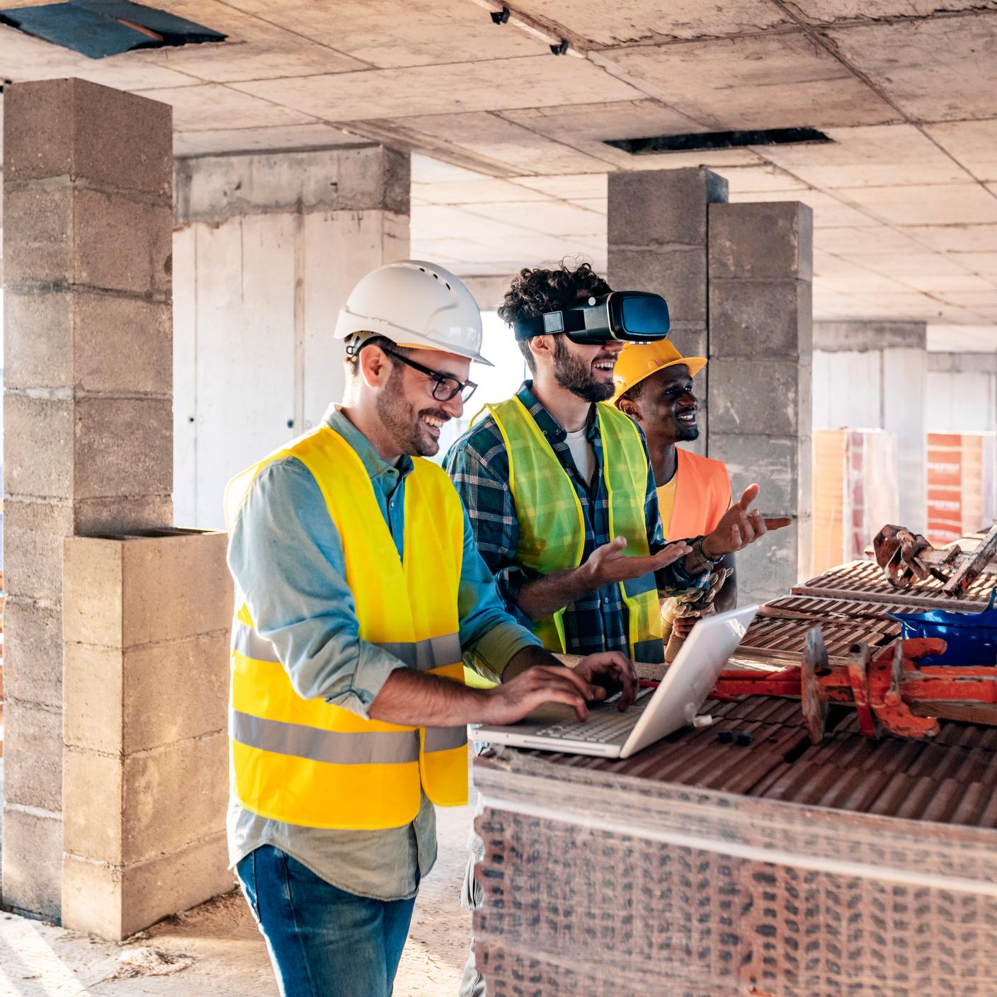 Architect & engineer working and talking about project planning and progress of work schedule on the home building construction site. 